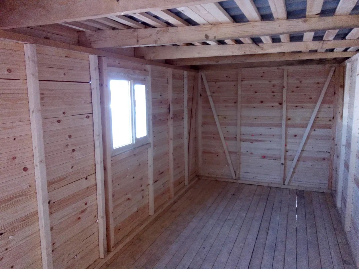 Бытовка №4 с дровником 2,3х5,8м (без отделки, без утепления)